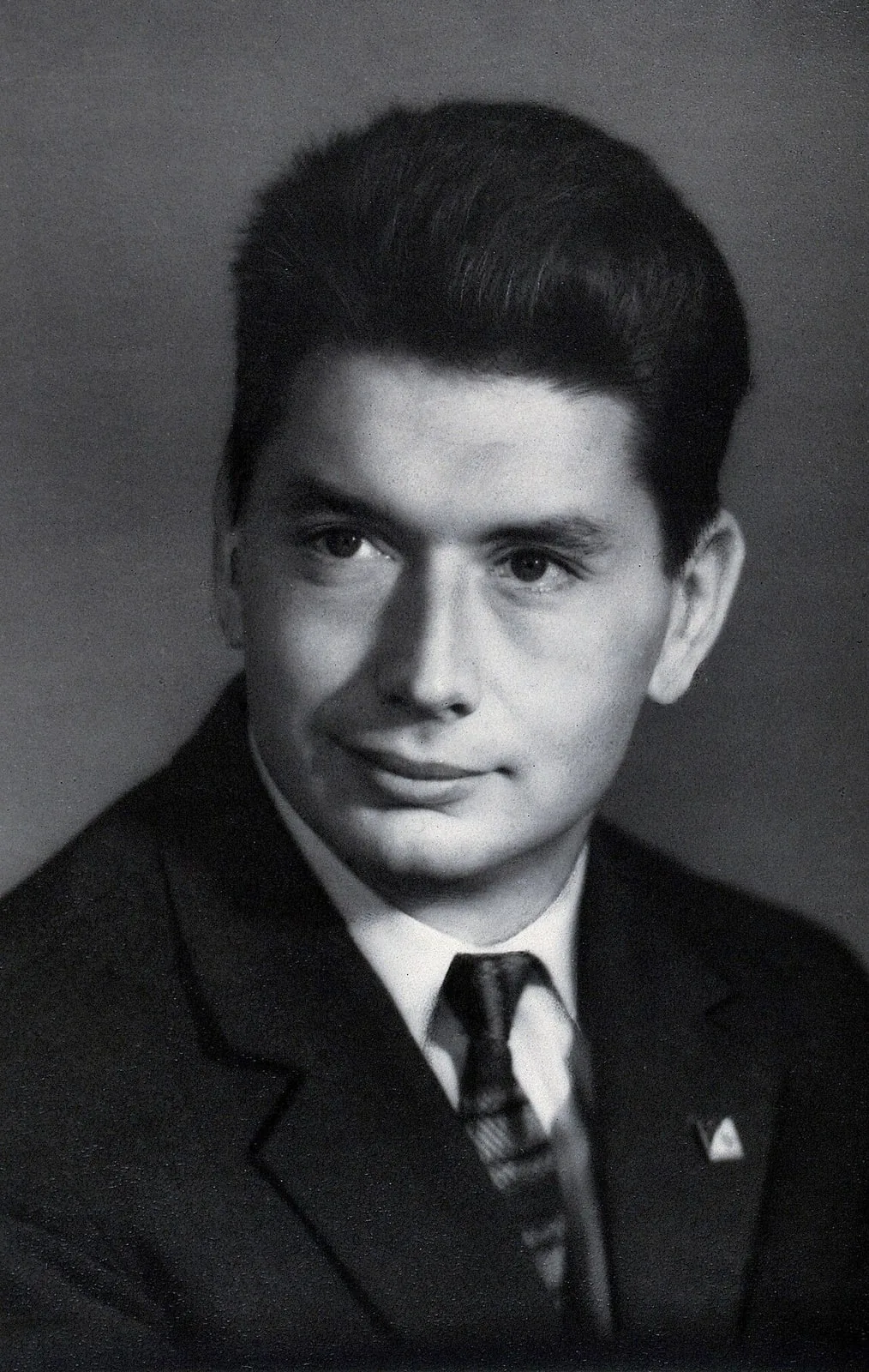 Boris Yegorov in a dark suit and tie