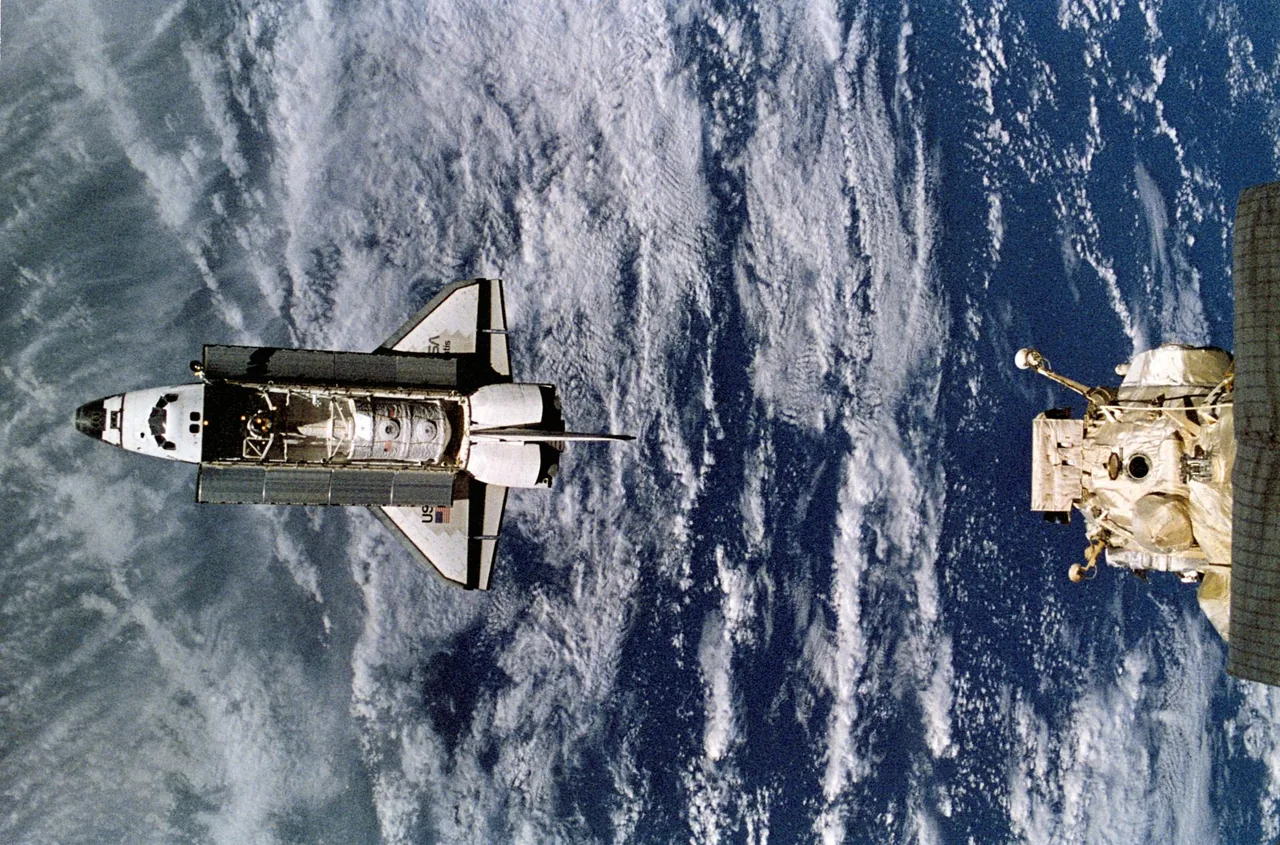Space Shuttle Atlantis approaches Mir before the first Shuttle–Mir docking