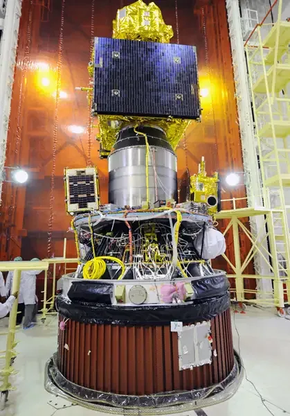 Resourcesat-2 and smaller co-passenger hardware on a launch payload stack inside an integration facility