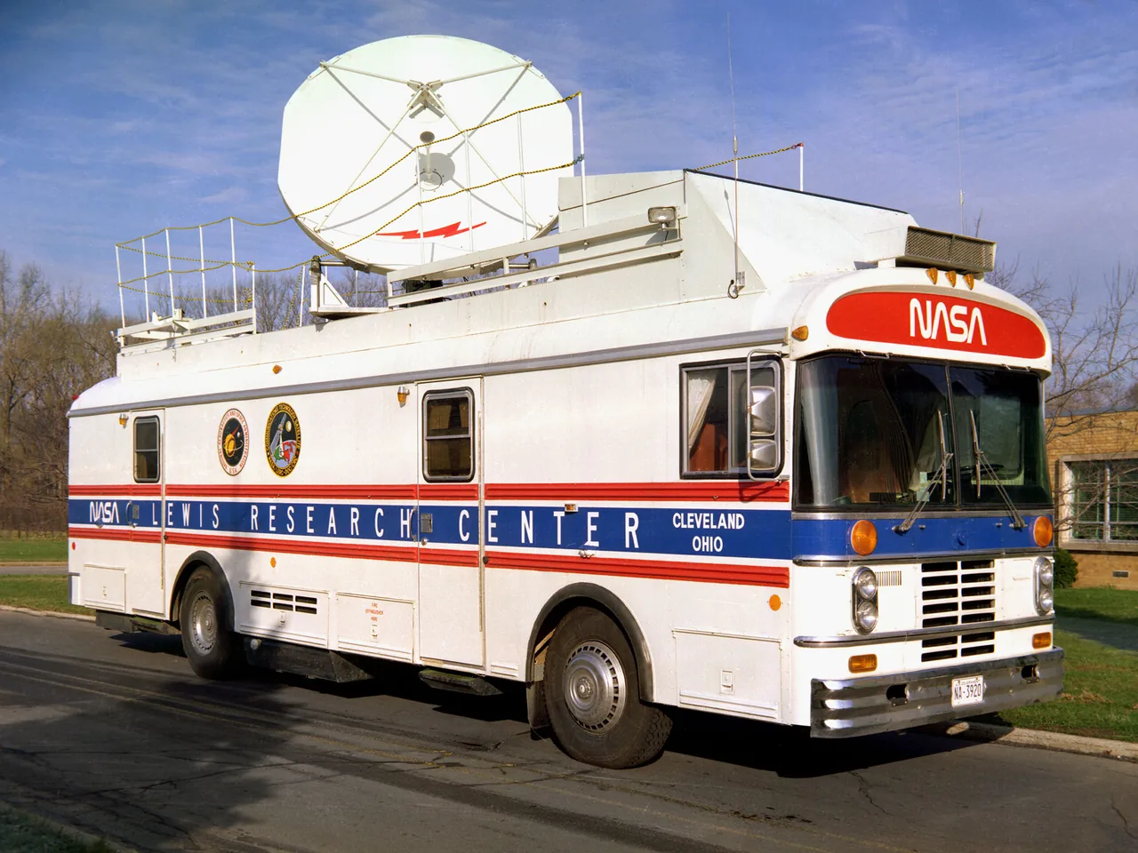NASA Lewis mobile terminal with a large rooftop dish and communications equipment inside its bus body
