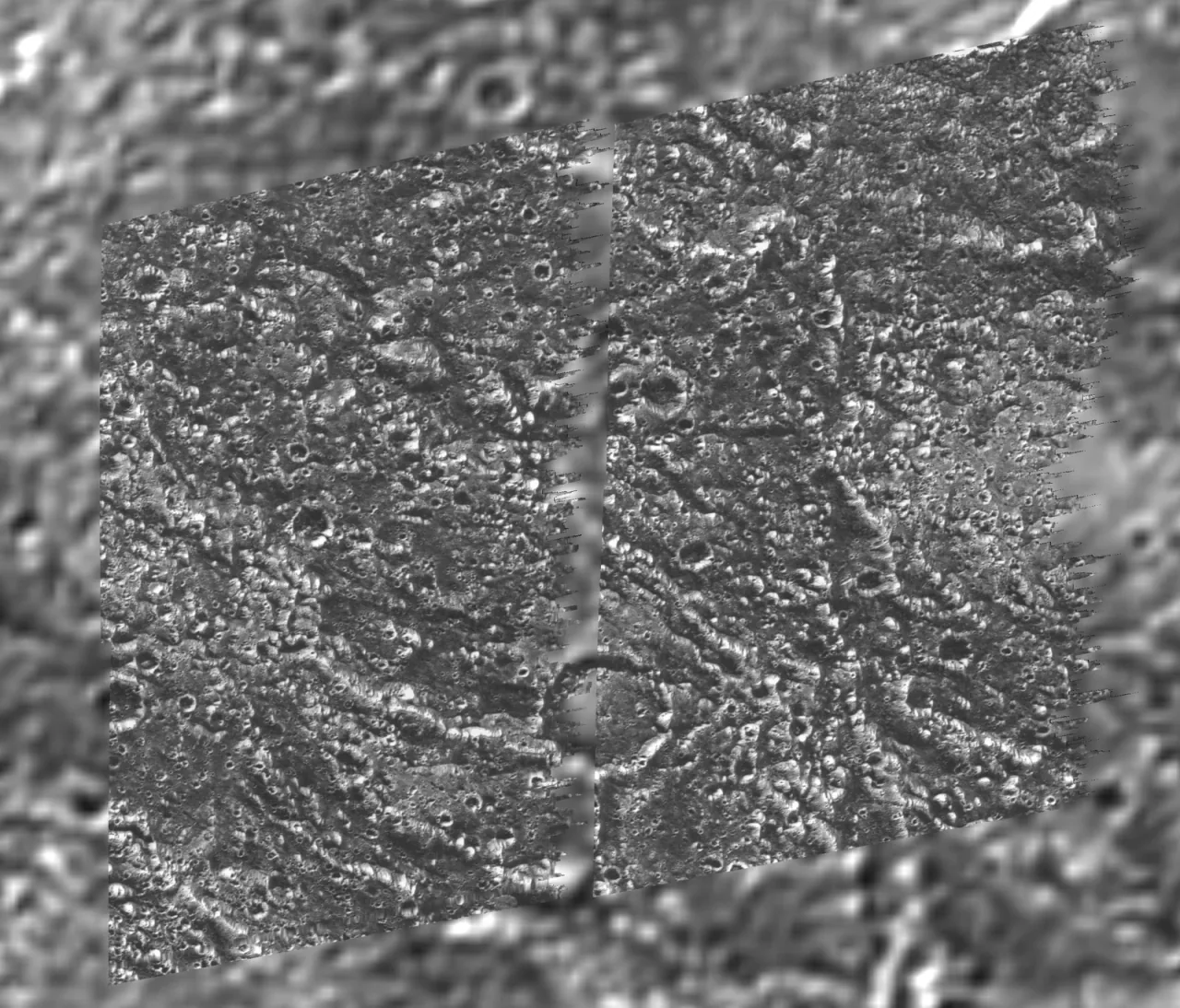 A grayscale mosaic of cratered terrain on Ganymede with differing visible levels of detail