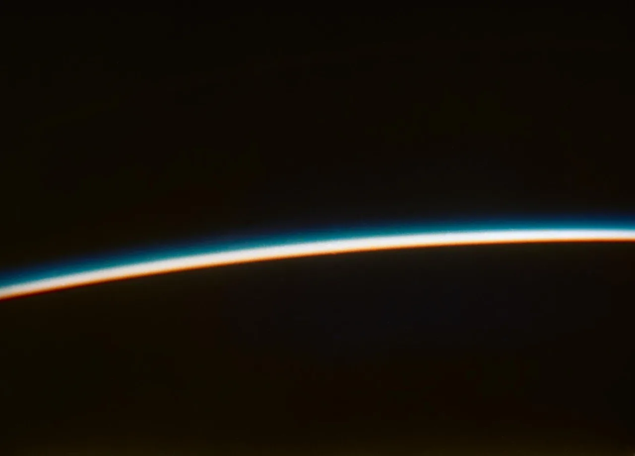 A curved Earth horizon and sunset photographed from Friendship 7