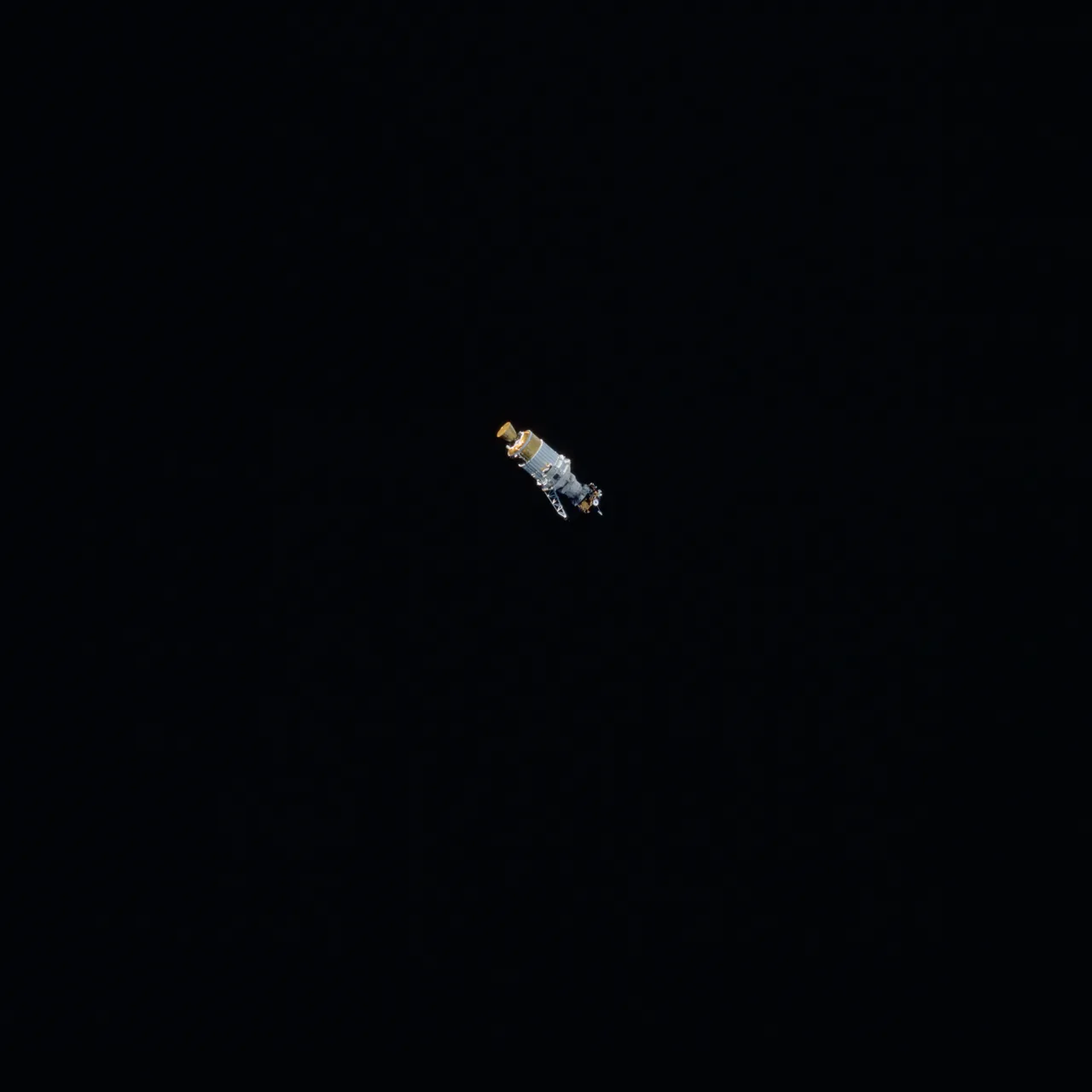 The small Ulysses and propulsion-stage assembly departs into black space after release from Discovery