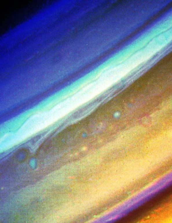 A processed color view of bands and small cloud features in Saturn’s northern atmosphere